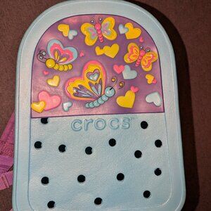 Crocs 10" X 7" Light Blue Zippered Backpack with butterflies